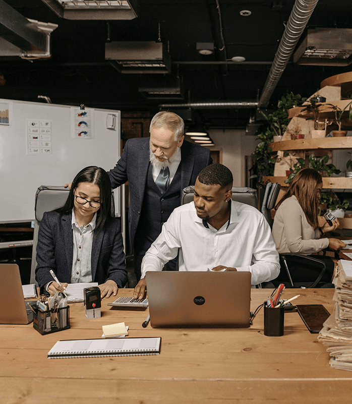 Business professionals collaborating in a modern workspace.